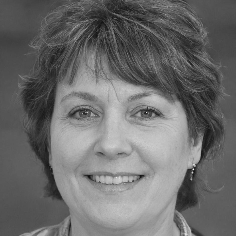 Retrato profesional de la coordinadora del programa